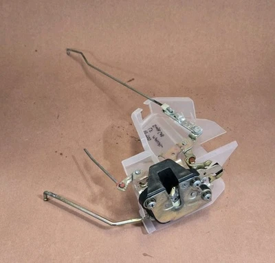 Actuador de pestillo de cerradura de puerta Toyota T100 93-98 lado izquierdo manual AISIN OEM Foto 1 de 4