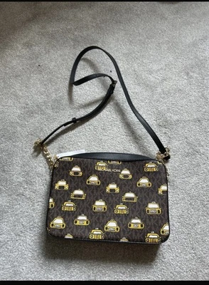 Rare Michael Kors Taxi Crossbody Bag - Image 1 of 4