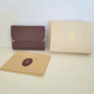 Must de Cartier Paris Vintage dreifach faltbare Leder bordeauxrot Geldbörse Medium Kissloc - Bild 1 von 11