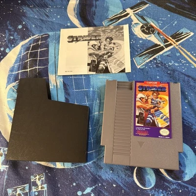 Strider (Nintendo NES, 1990) AUTHENTIC Cart And Manual Working - Image 1 of 4