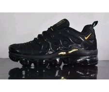 vapormax negro con dorado