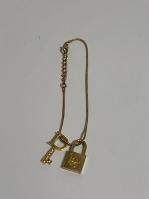 Pulsera de oro Christian Dior de John Galliano de colección con llave y cerradura Foto 1 de 4