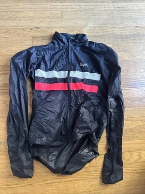 Chaqueta cortavientos ligera Rapha Pro Team empaquetable pequeña, rosa y blanca a rayas Foto 1 de 4