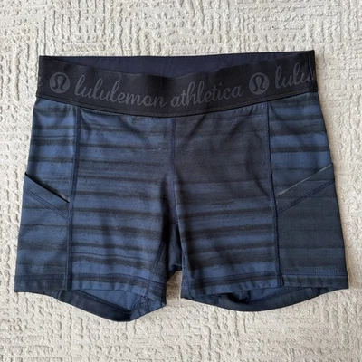 Pantalones cortos de bicicleta Lululemon Athletica para mujer talla 6 rendimiento bolsillos laterales a rayas Foto 1 de 4