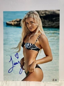 FOTO 11X14 FIRMADA POR OLIVIA LIVVY DUNNE AUTO BECKETT SUPERMODELO SI TRAJE SUIZO BAJO CERTIFICADO DE AUTENTICIDAD - Imagen 1 de 3