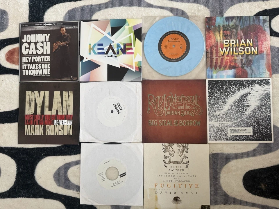 7”  Lot - Dylan, Cash, Bright Eyes, Kane, LaMontagne, Kings Of Leon, Ryan Adams - Image 1 of 1