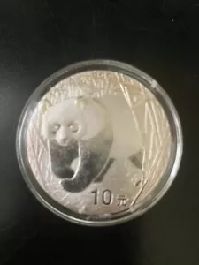 2 Silver coins 1 Is a 2001 & the second 1 is a 2002 CHINA 10 YEN PANDA - Picture 1 of 3
