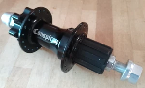 Conspiracy NOS Rear Downhill Hub 150mm 12mm Alloy Axle & nuts Black Sealed - Picture 1 of 3