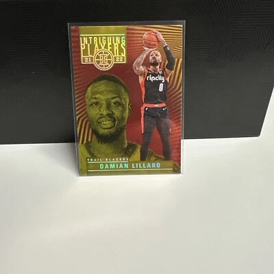 2021-22 Panini Illusions Intriguing Players #24 Damian Lillard Asia Red Yellow - Image 1 of 2