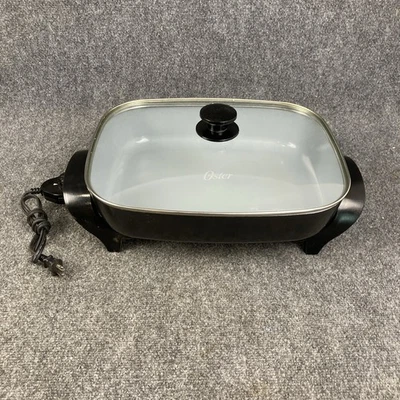 Sartén eléctrica Oster CKSTSKFM16-TECO cerámica con infusión de titanio 1500 W 12 x 15" Foto 1 de 4