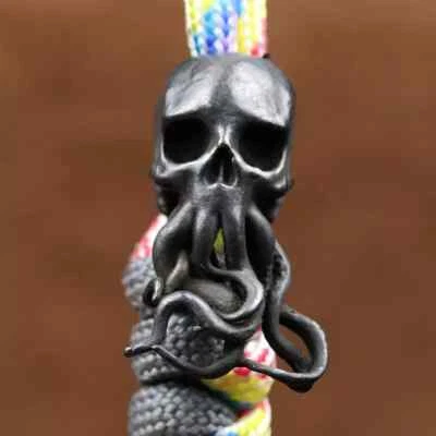 Calavera EDC Pulpo Latón Paracord Cuchillo Cordón de Cuentas Hágalo Usted Mismo Herramienta Cuerda Colgante Dije Foto 1 de 4