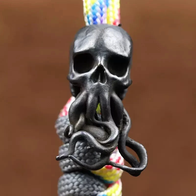Calavera EDC Pulpo Latón Paracord Cuchillo Cordón de Cuentas Hágalo Usted Mismo Herramienta Cuerda Colgante Dije Foto 1 de 4