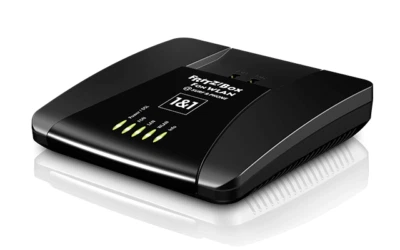 AVM FRITZ!Box 7112 - ADSL Router mit WLAN N mit VoIP & DECT 1und1 (20002454) - Bild 1 von 3