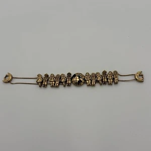 Bracciale Vintage "Bambini del Mondo" - Tono Oro - Foto 1 di 9
