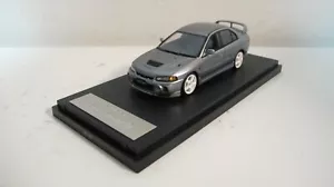 1:43 MARK43 MITSUBISHI LANCER GSR EVOLUTION IV AUTO IN RESINA GRIGIA - Foto 1 di 6