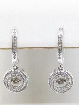 Pendientes únicos Huggie de diamantes de oro blanco de 10 k 4,3 g con ilusión ojo de iris Foto 1 de 4