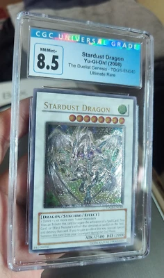 CGC 8.5 Yugioh TDGS-EN40 Stardust Dragon Ultimate Rare Unlimited BGSPSA - Image 1 of 2