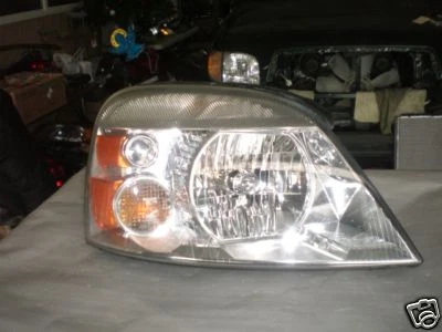 Faro pasajero derecho Ford Freestar 2004-2007 OEM COMPLETO PROBADO DE FÁBRICA #2 Foto 1 de 2