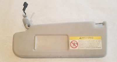 2002-2005 Volkswagen Passat Driver Sun Visor- Gray - Good Condition - Image 1 of 2