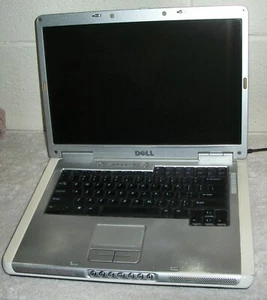 Vintage Dell Inspiron E1505 Silver Laptop No Charger Does not Boot For Parts - Picture 1 of 10