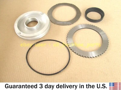 JCB BACKHOE - TRANSMISSION PISTON REVERSER C/W BAFFLE KIT (PART NO. 445/12316) - Image 1 of 4