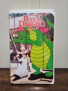 VHS Vintage Disney's Pete's Dragon White Clamshell - Picture 1 of 4