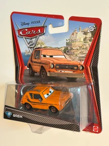Disney Pixar Cars 2 GREM #13 LEMON 2010 Cars 2 embalaje ¡RARO! Mattel - Imagen 1 de 2