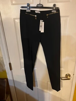 Pantalones formales Versace para mujer negros con logotipo de Medusa en cremallera 40 G34598 $525 Foto 1 de 4