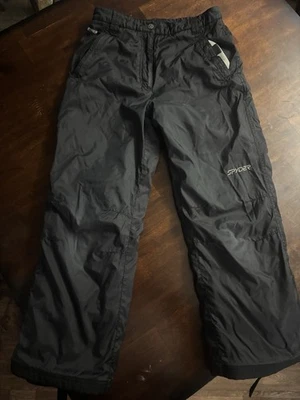 Pantalones de nieve aislados Spyder para niños, talla grande Foto 1 de 4