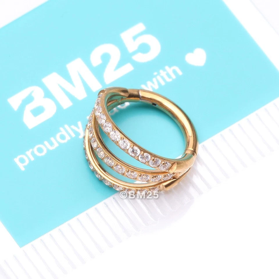 Anillo de aro clicker sin costuras de acero con triple aro forrado con gema brillante brillante Foto 1 de 4