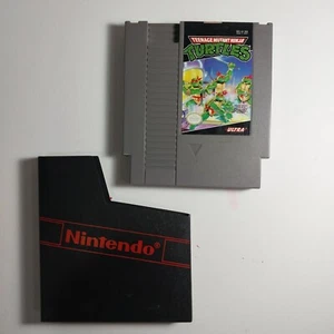 TEENAGE MUTANT NINJA TURTLES NINTENDO NES VIDEO GAME AUTHENTIC - Picture 1 of 4