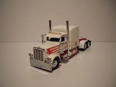 DCP FIRST GEAR 1/64 DAWES RED AND WHITE PETERBILT 389 WITH 63" SLEEPER - Image 1 of 4