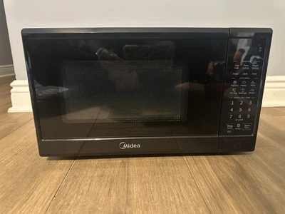 Midea 0.7 cu ft Countertop Microwave - MMC07S1ABB - Image 1 of 4
