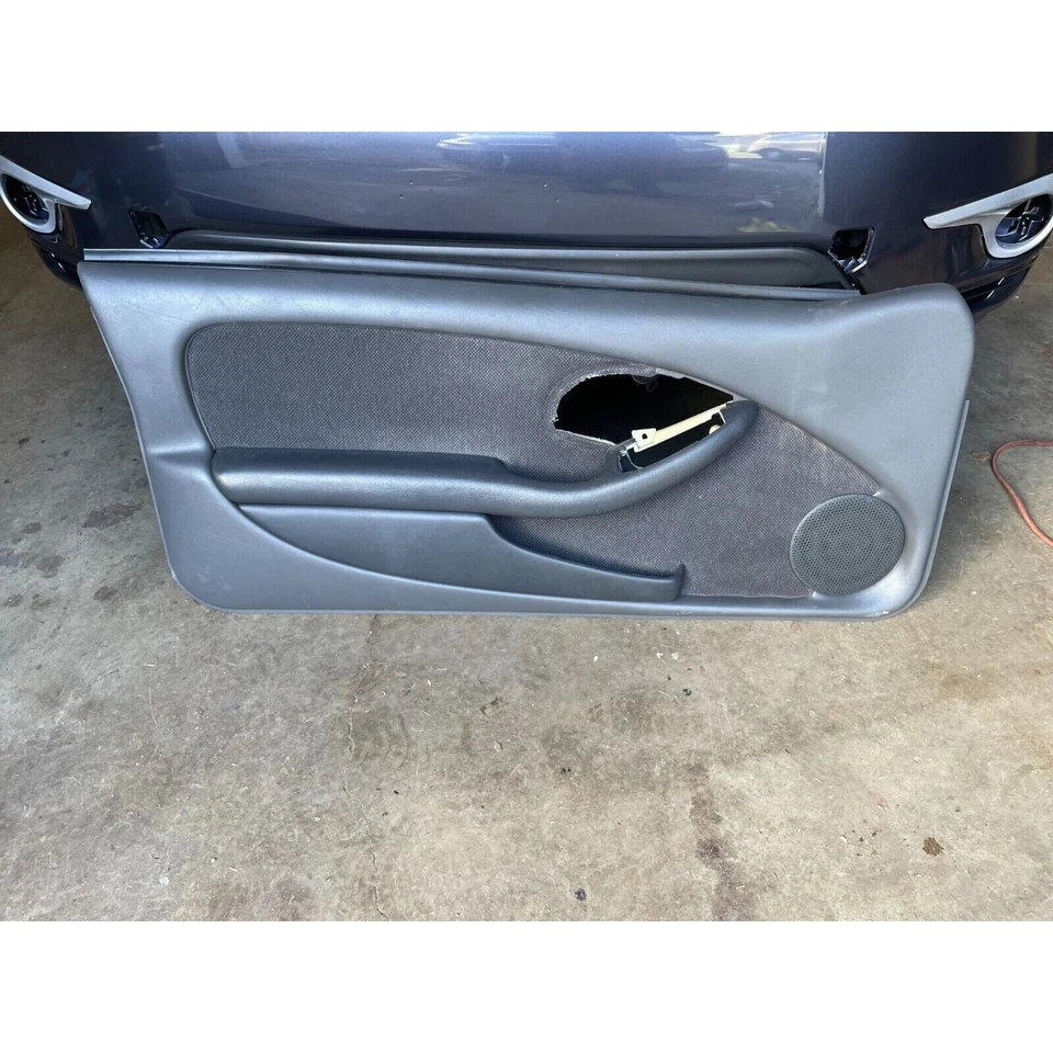 Pontiac Firebird Formula 1993-1997 gris grafito panel de puerta lateral del conductor usado OEM Foto 1 de 4