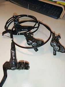 Set Shimano ZEE freni anteriore postertiore 4 pistoncini Enduro DH - Bild 1 von 7