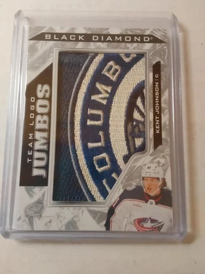 2024-25 Upper Deck Black Diamond Kent Johnson Logo Jumbos TL-KJ Blue Jackets - Image 1 of 2