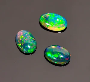 Natural Black Ethiopian Opal Cabs Oval Shape Gemstone 2.3 Ct 3 Pcs 9X5X3 mm - Picture 1 of 2