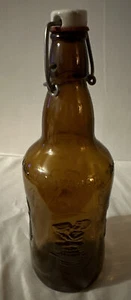 Vintage Fischer Amber Glass Bottle w/ Wire Bail And Ceramic Stopper - Picture 1 of 4