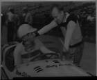 Jackie Holmes sits in the #77 Norm Olson Special as car entrant 1950 Indy Photo