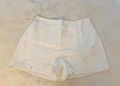 shorts mujer blanco con volantes delanteros Foto 1 de 4