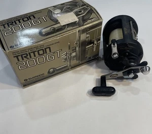 Carrete de pesca ligero Shimano Triton 200GT probado funciona muy bien con caja - Imagen 1 de 15