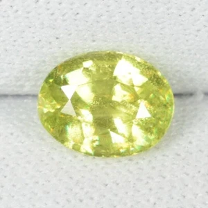 1.34 ct DAZZLING YELLOW GREEN MULTI SPARKLING  NATURAL SPHENE - Oval  See Vdo CL - Picture 1 of 3