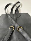 Black Faux Leather Backpack Zippers Gold Tassles Nice Design Good Quality