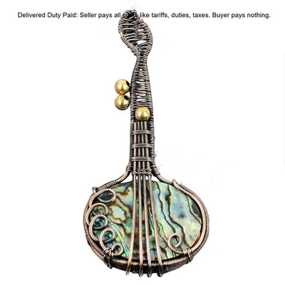 Guitarra concha de abulón de cobre piedras preciosas y alambre envuelto hija colgante joyería Foto 1 de 4