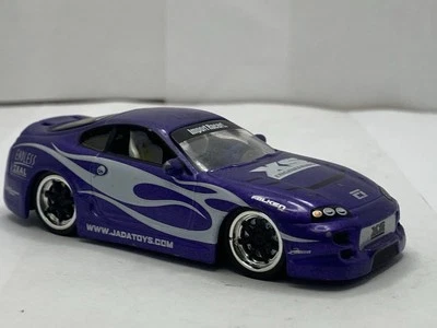 Toyota Supra Purple Import Racer Jada Toy Diecast Car NO Spoiler 1/64 Real Rider - Image 1 of 4