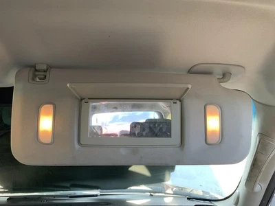 Used Right Sun Visor fits: 2007 Chevrolet Suburban 1500 new style smooth door sk - Image 1 of 4