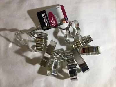 Juego/colgador de galletas de metal Farberware Professional 9 piezas todas las estaciones 2004 Foto 1 de 4