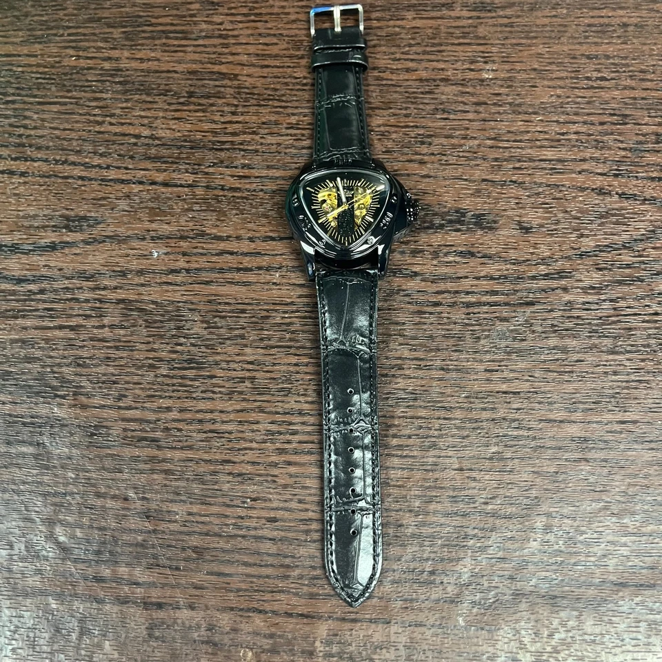Reloj para hombre WINNER triángulo esqueleto correa de cuero negro esfera dorada A 516 Foto 1 de 4