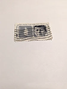 U.S. JFK 5 cent Stamp "the glow from that fire can light the world" 1917-1963 - Picture 1 of 5