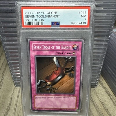 2003 YuGiOh 1st Edition Seven Tools Of The Bandit #045 PSA 7 NM SDP - Image 1 of 4